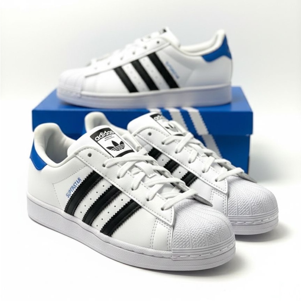 Adidas Classic White and Black Sneakers with Blue Accents